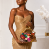 Corvane MAJESTA 5632 top handle bag shown handheld with tan-beige jacquard lace, colourful embellishment and gold-tone leopard handle