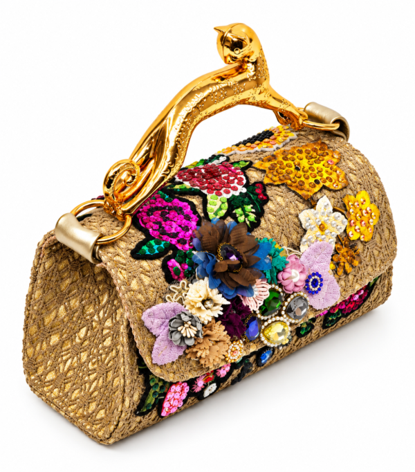 Corvane MAJESTA 4276 top handle bag, side view showing tan-beige jacquard lace, light metallic gold leather and sculptural gold-tone leopard handle