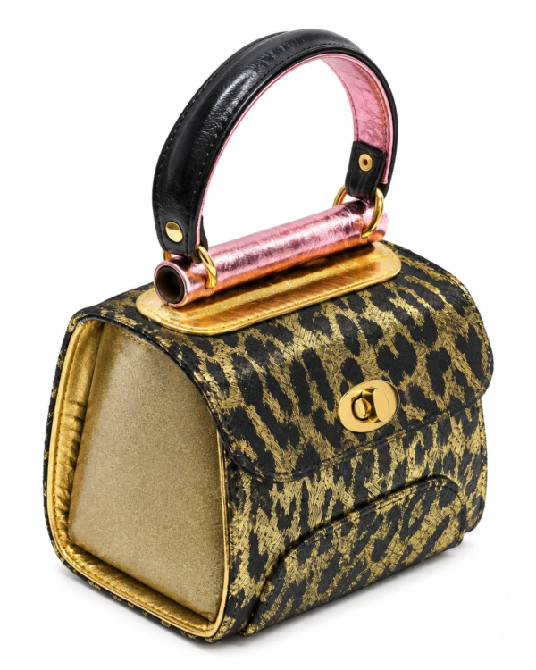 HelaSol AL MMidi Leopard Olivine structured handbag, top-side angled view showing black and metallic-gold leopard patterning, metallic pink handle bar and muted olive-gold patent leather side panel