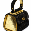 HelaSol AL MMidi Noir Doré close-up showing black suede with gold flecks, gold-toned handle base and light gold foil side panel