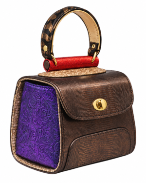 HelaSol AL MMidi Viola Bronze structured handbag, front-side angled view showing metallic bronze-brown body, embossed metallic-purple side panel and metallic-red handlebar