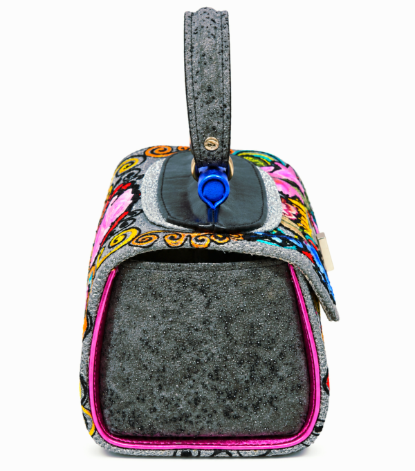 HelaSol Roidery Midi 6194 handbag, side view showing charcoal speckled leather panel framed with vivid pink leather trim