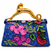 Corvane MAJESTA 6241 top handle bag, back view showing blue jacquard lace with layered floral embellishment and sculptural gold-tone leopard handle