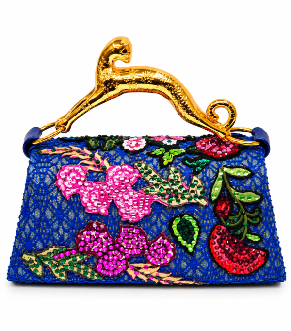 Corvane MAJESTA 6241 top handle bag, back view showing blue jacquard lace with layered floral embellishment and sculptural gold-tone leopard handle