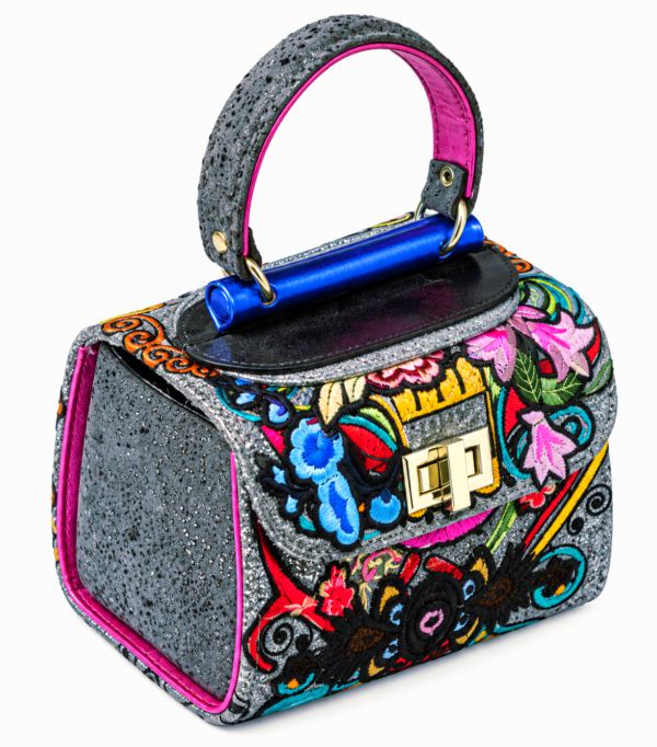 HelaSol Roidery Midi 6194 handbag, Top-side angled view showing multicolour floral Roidery, charcoal speckled side leather and cobalt blue handlebar