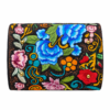 HelaSol Roidery Midi 3528 base view showing multicolour floral Roidery extending across the suede leather base with gold-tone protective feet