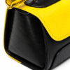 HelaSol AL Chōnmun MM Noir Soleil close-up showing black leather side panel, vivid yellow textured leather flap and gold handlebar detailing.