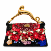 Corvane MAJESTA 6914 top handle bag in black jacquard lace with red floral embellishment, pearl accents and sculptural gold-tone leopard handle