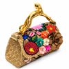 Corvane MAJESTA 5632 top handle bag, front-side angled view showing tan-beige jacquard lace, layered embellishment and gold-tone leopard handle