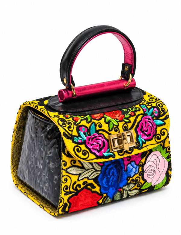 HelaSol Roidery Midi 2845 handbag, angled view showing floral Roidery, glossy black side leather and fuchsia handlebar